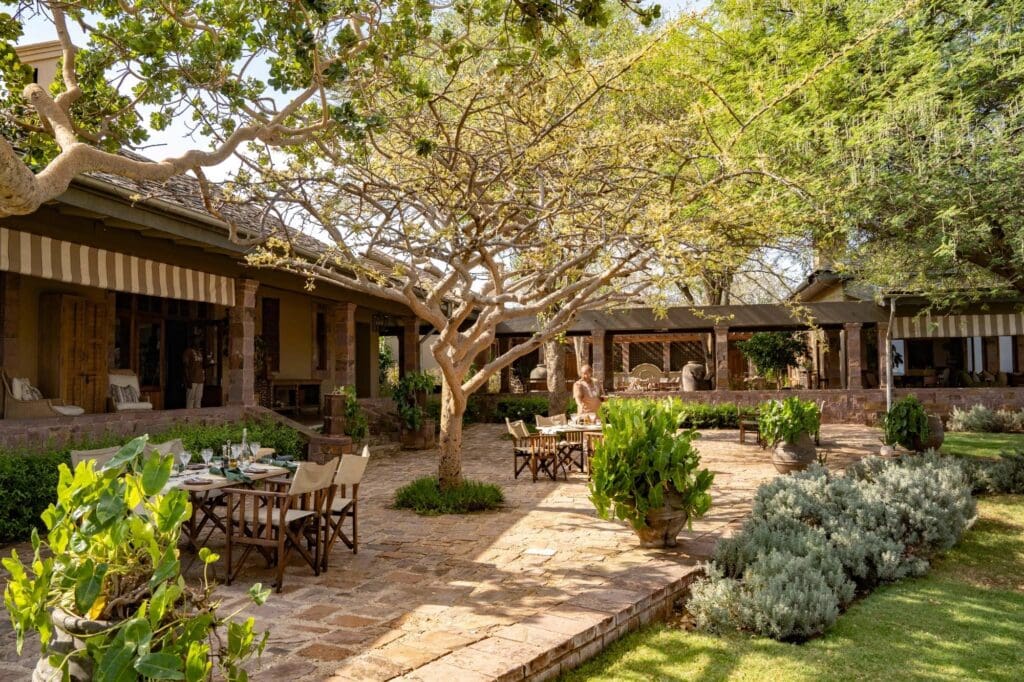 Image showing Singita Sasakwa garden dining setup on a luxury African safaris with Planet Africa Safaris | blog
