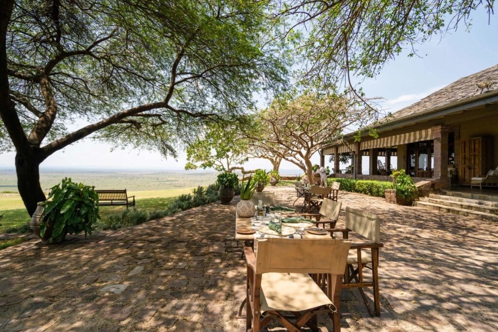 Image showing Singita Sasakwa dining setup on a luxury African safaris with Planet Africa Safaris | blog